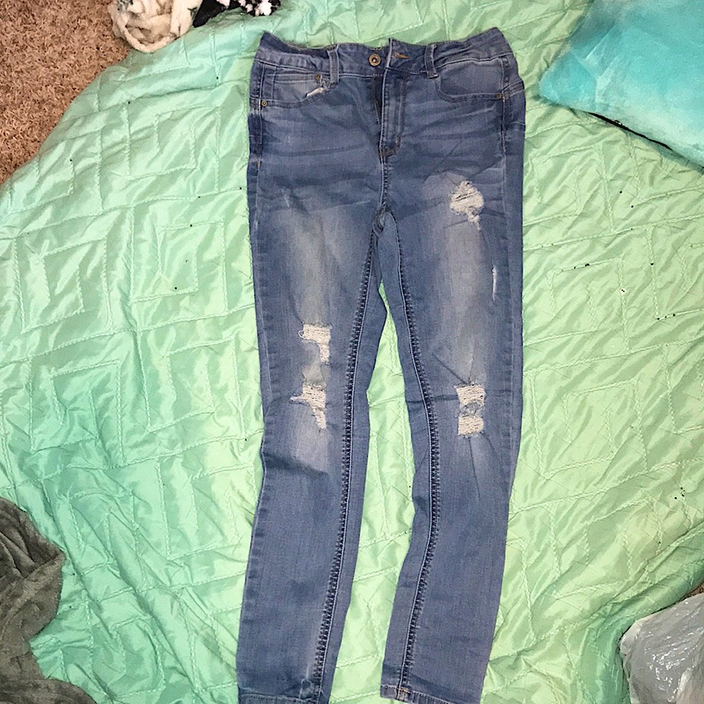 Mid rise blue ripped jeans